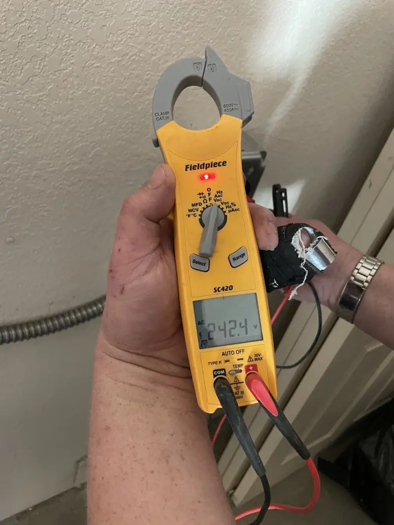 Voltage testing with clamp meter during Hot Tub / Pool Electrical Wiring in Garden City